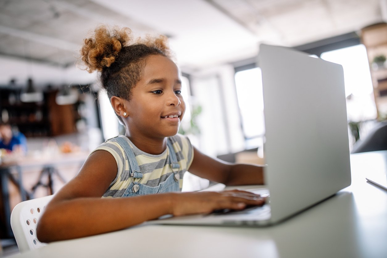 Child infront of computer