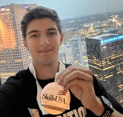 SkillsUSA National Silver Medal earned by a student following literacy intervention