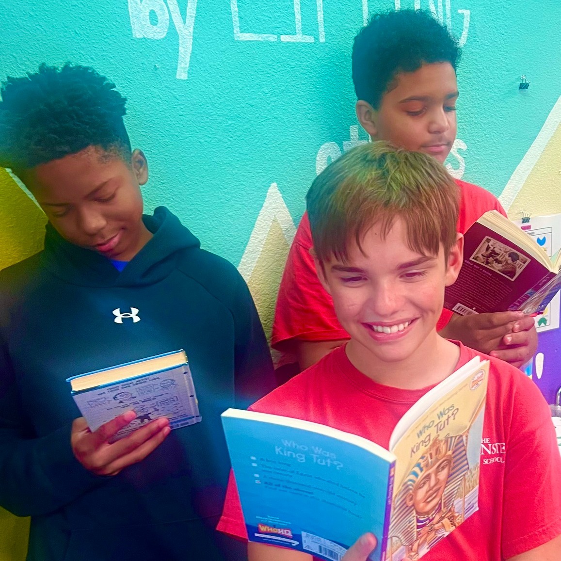 Students at The Einstein School reading independently after instruction with NOW! Programs®, demonstrating improved literacy outcomes in reading and spelling.